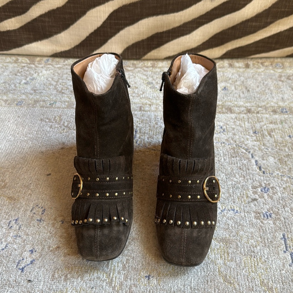 Brown boot with gold hardware